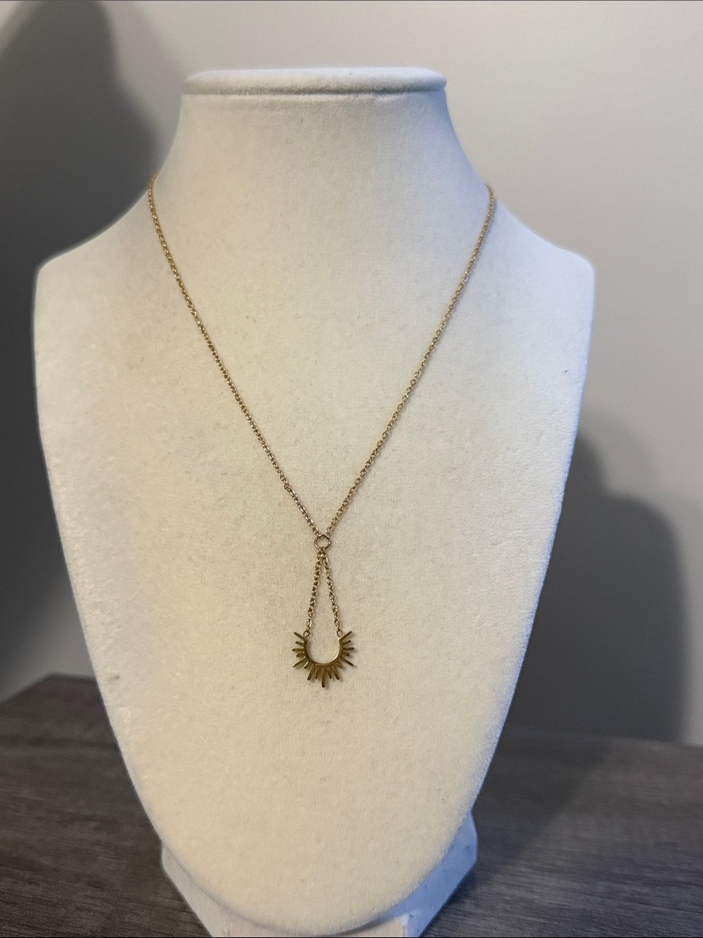Gold plated stainless steel hanging sun necklace